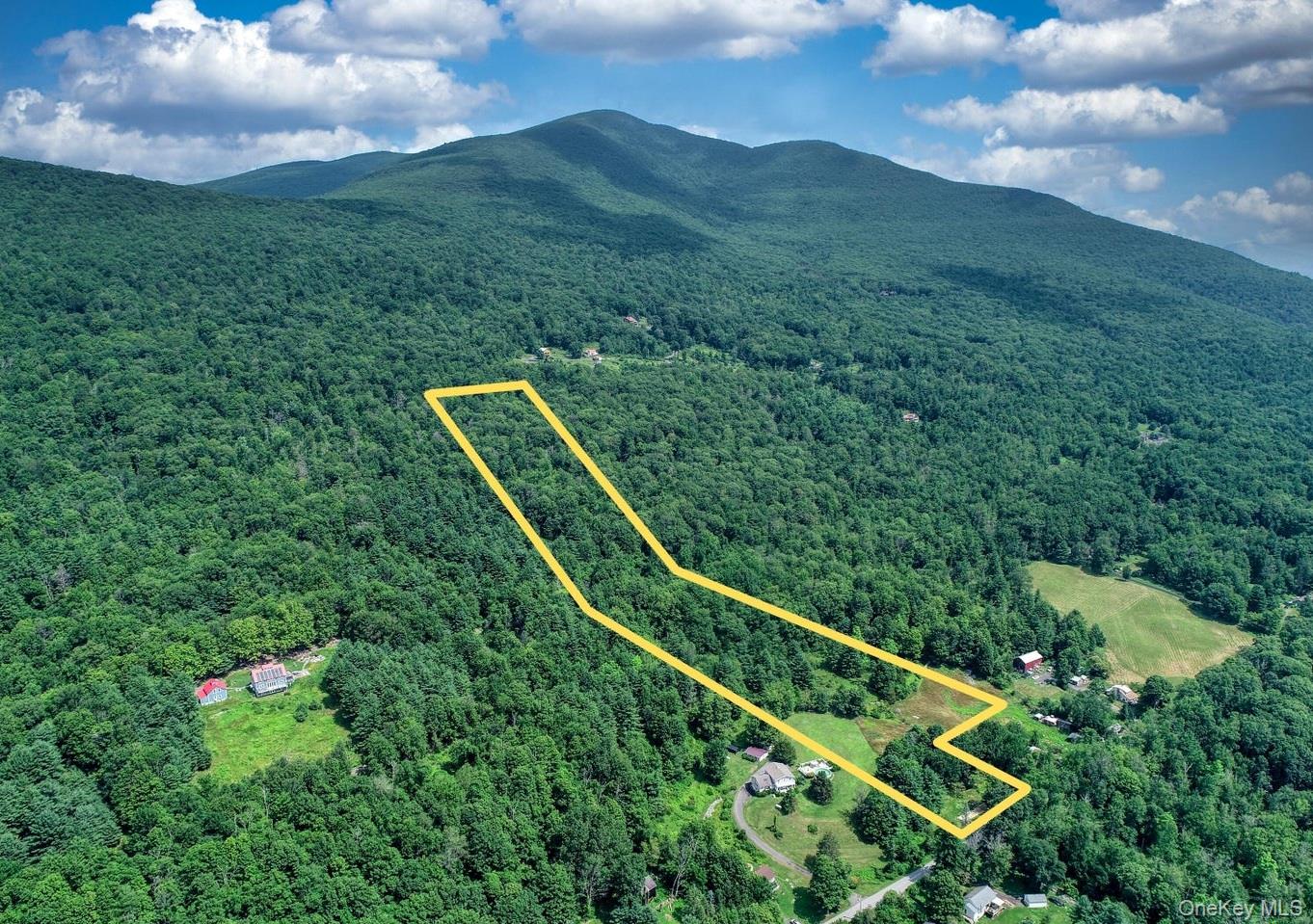 Aerial view of property's location featuring property parcel outlined