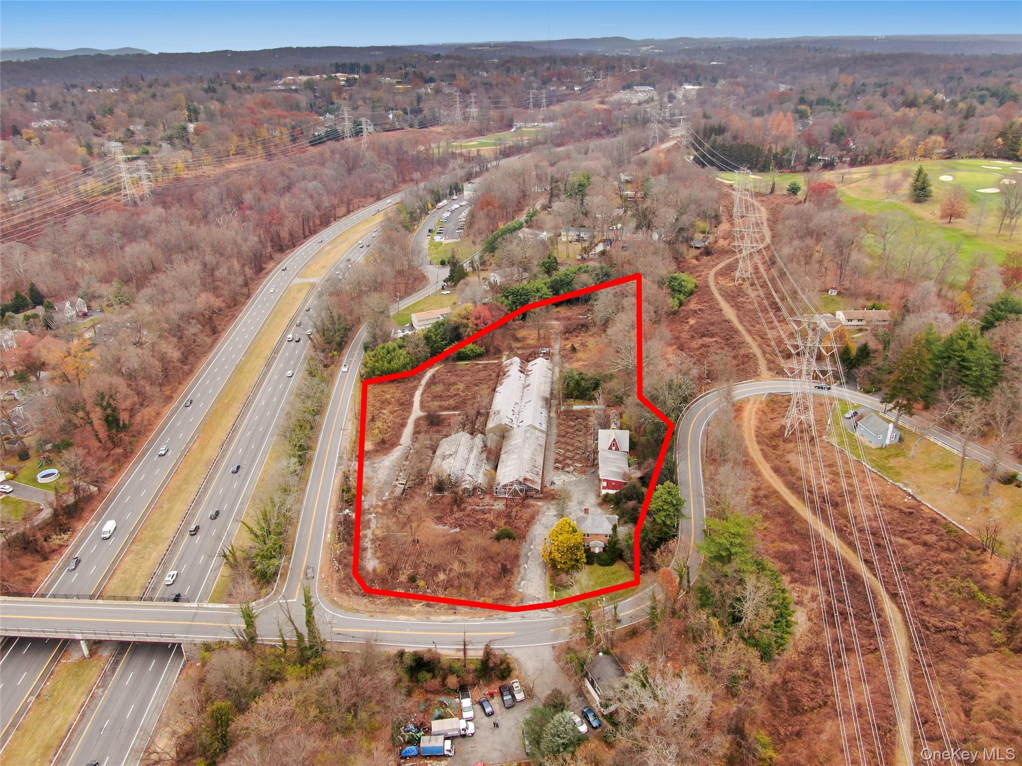 View of property location featuring property boundaries highlighted and a major roadway