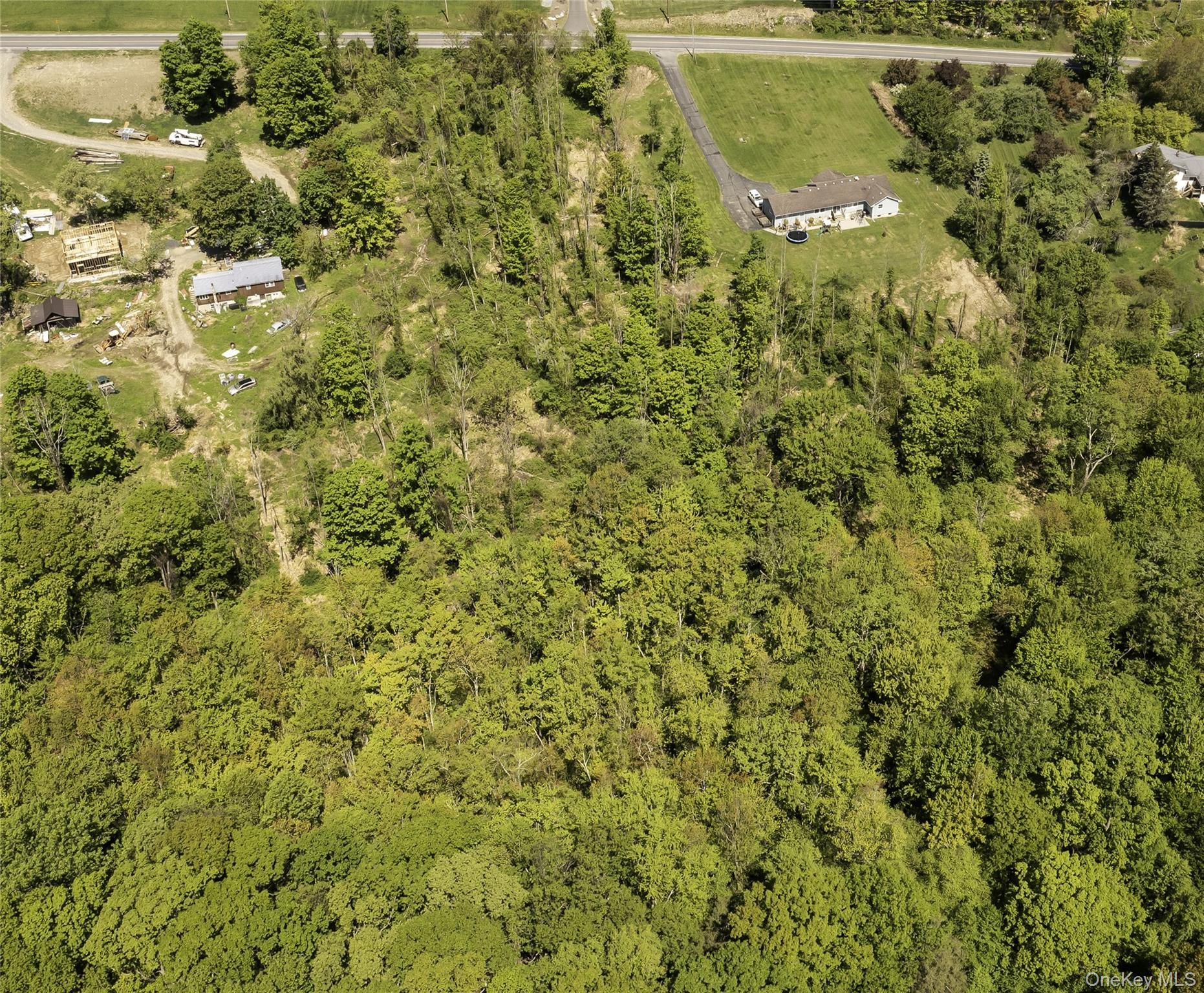 View of land. Property is located between house #534 and #554. This is vacant land for sale.