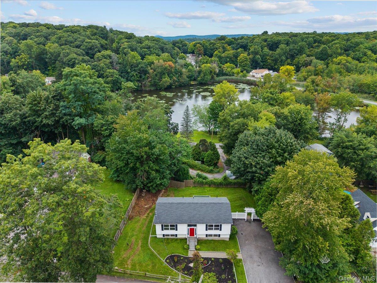 Picture Perfect Lake Carmel Setting Welcomes You