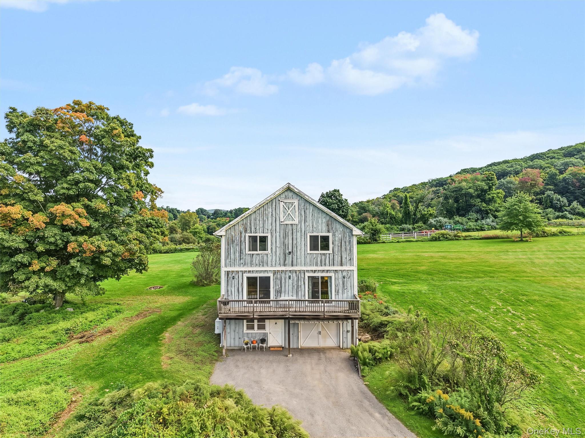 Custom-built in 2005. Barn-inspired architecture.