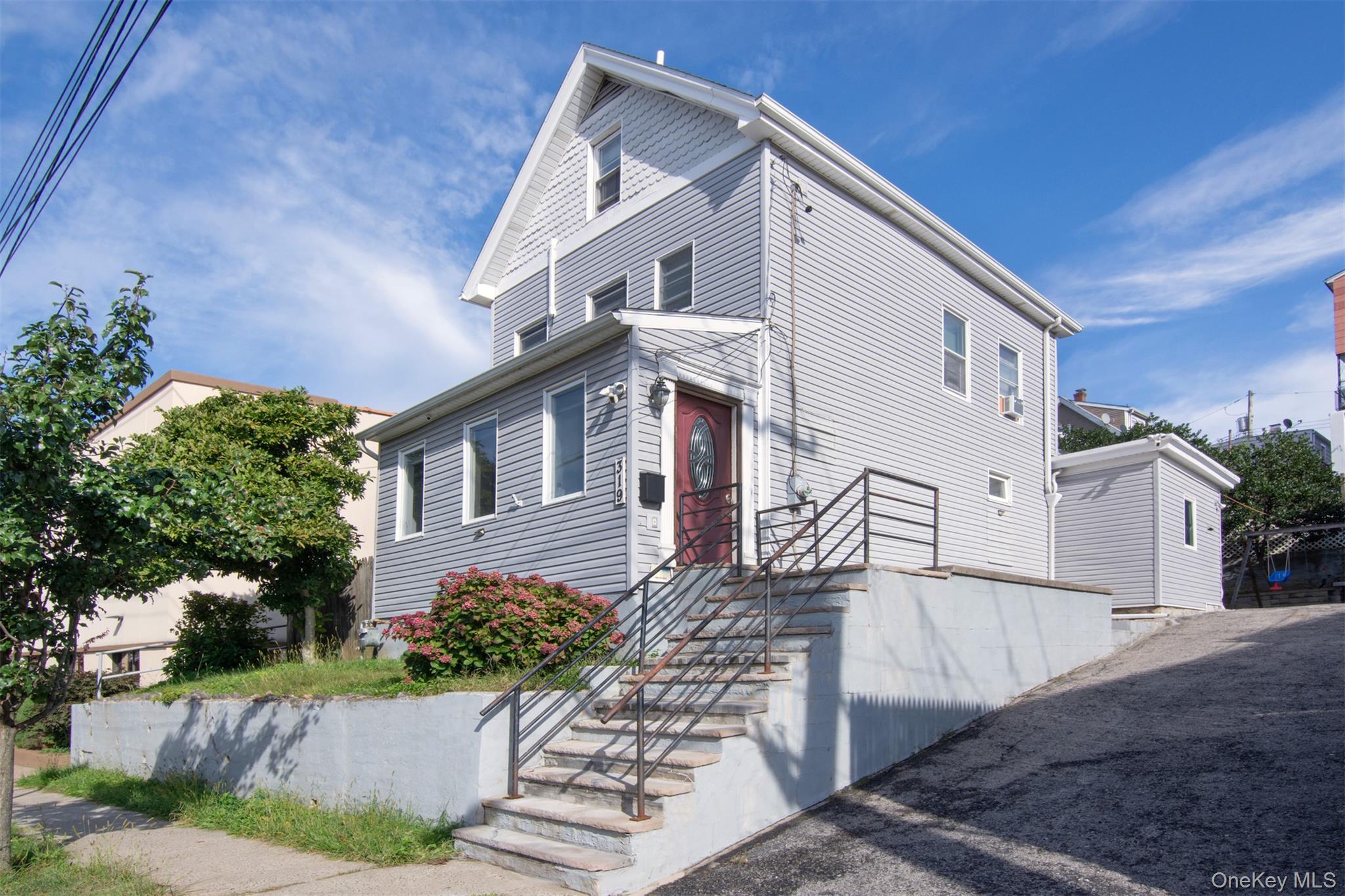 Lovely Home with long driveway . Plenty of parking!!