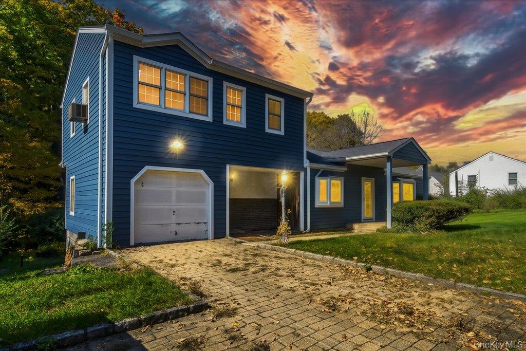 Enhanced Photo of property without front  trees